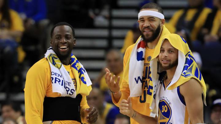 Draymond Green, JaVale McGee y Stephen Curry.