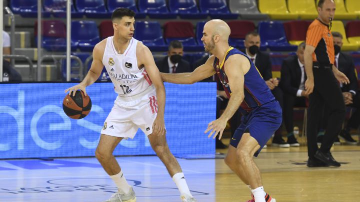Carlos Alocén y Nick Calathes.