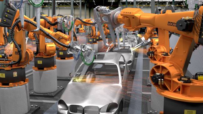 Robots de una cadena de montaje de coches
