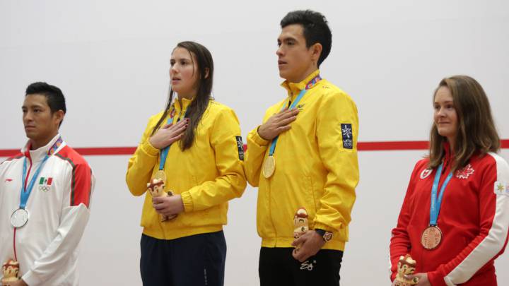 Miguel Ángel Rodríguez y Catalina Peláez, ganadores de medalla de oro en squash en los Juegos Panamericanos.