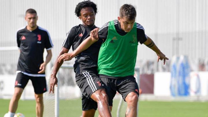 Juan Guillermo Cuadrado y Dybala, jugadores de la Juventus