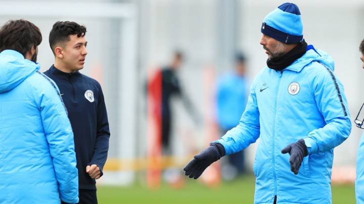 Guardiola y Poveda en el Manchester City