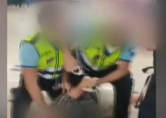 Madrid police take down mask dodging rail passenger