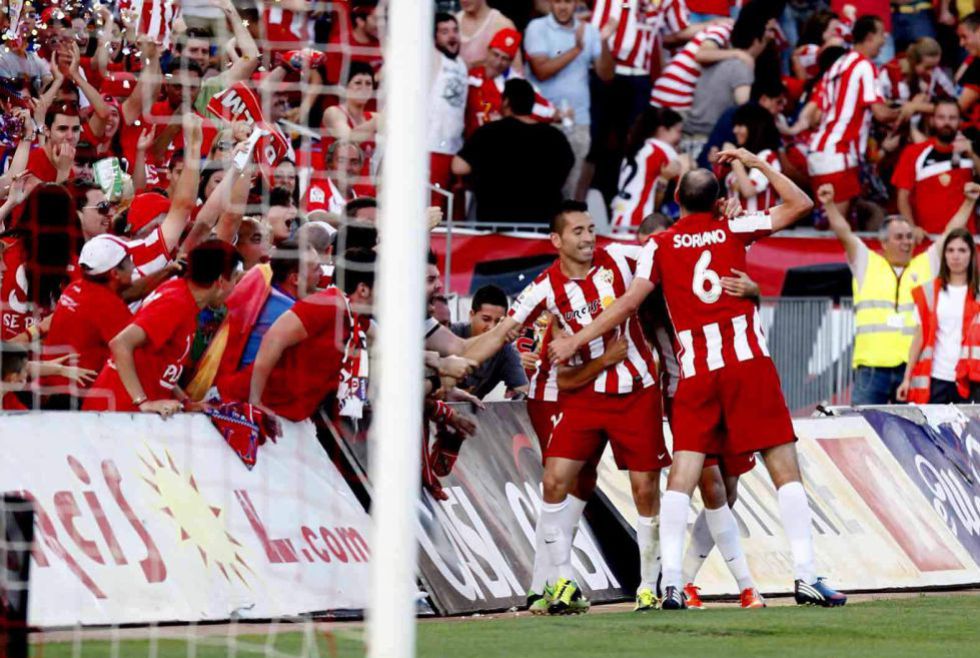 Charles at the double as Almería regain top flight status
