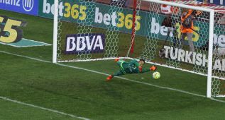 Navas saves Griezmann penalty