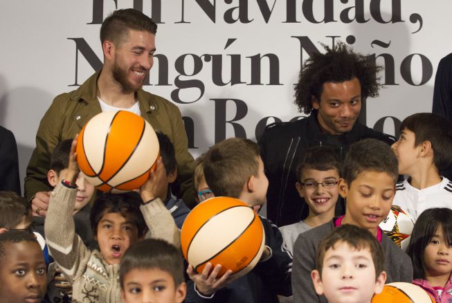 Real Madrid share out presents for children in need