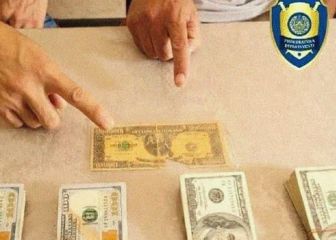 Detienen a dos hombres que intentaban vender un billete de un millón de dólares