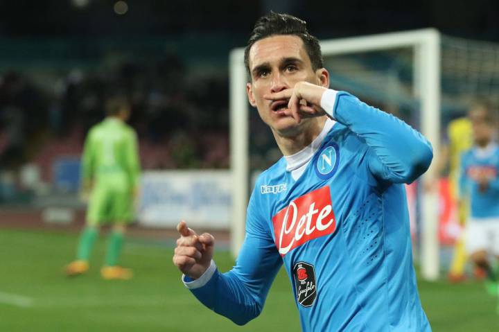 Napoli move joint top after seeing off Chievo