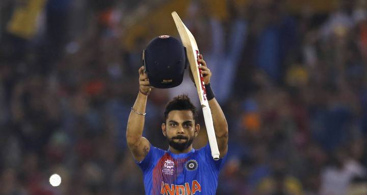 Kohli dazzles to propel India into World T20 semis