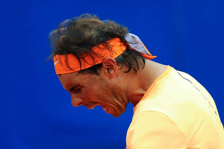 Nadal battles past Fognini to make Barcelona semis