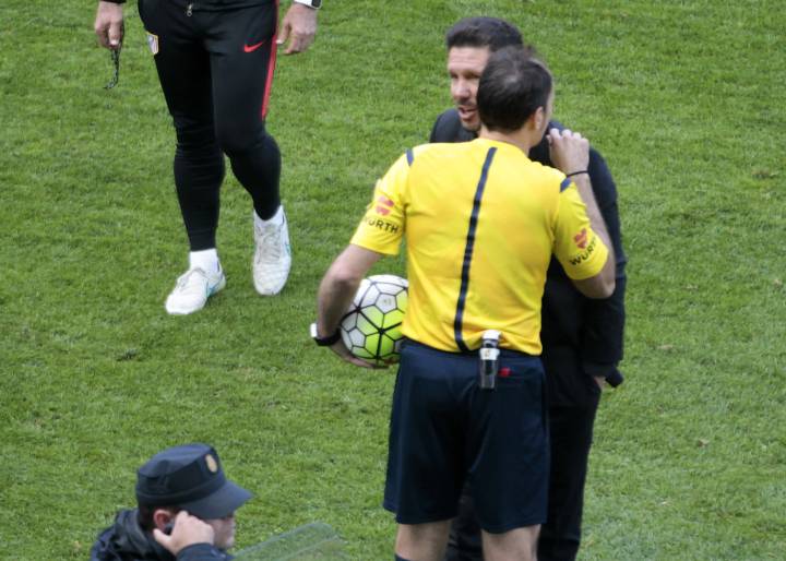 Simeone sent off after ball is thrown onto pitch during play