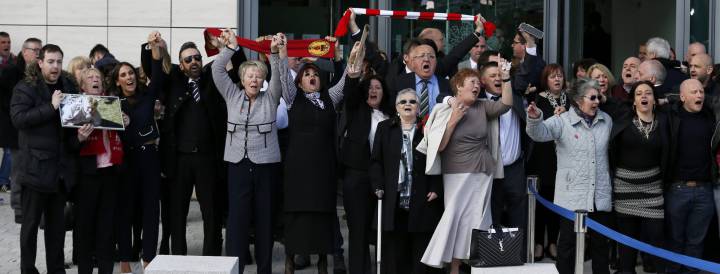 Relatives sing "You'll never walk alone" after the jury delivered its verdict at the new inquests into the Hillsborough disaster.