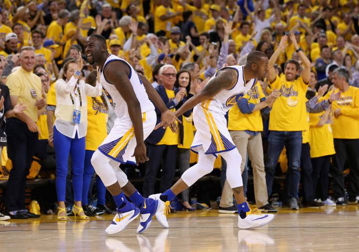 Draymond Green and Andre Iguodala celebrate the Warriors triumph in the second game against the Portland Trail Blazers.