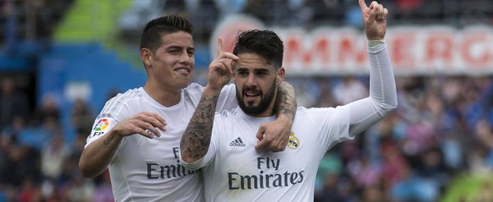 Isco and James, celebrating a goal together.