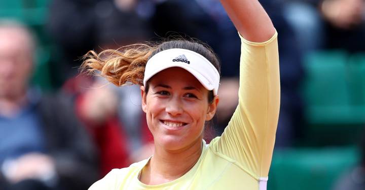 Muguruza scrapes through debut at French Open