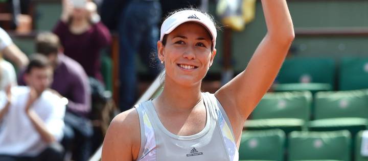 Spain's Muguruza beats Wickmayer to reach last 16