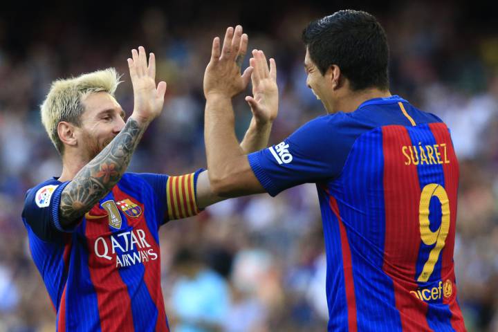 Suárez and Messi lead Barça rout of Real Betis