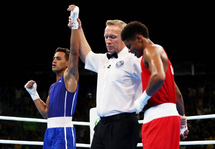 Cuban pummels Mayweather protégé to take gold
