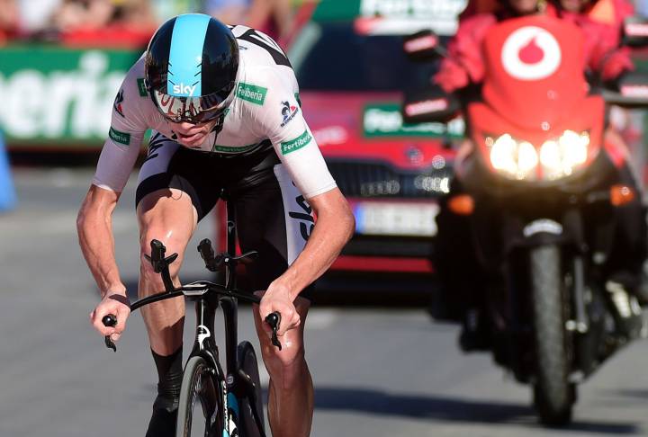 Froome storms to time trail win to slice Quintana’s lead