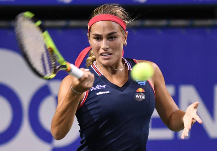 Monica Puig back to winning ways in rainy Tokyo