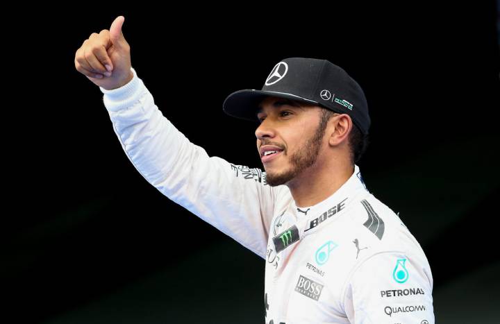 Hamilton blazes to pole and sets new lap record at Sepang