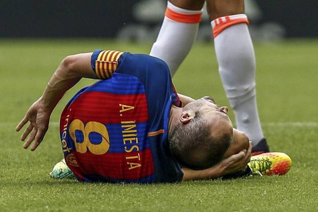 Iniesta to miss up to 14 games, including El Clásico