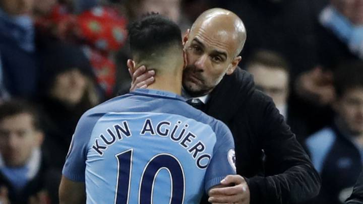 Manchester City's Sergio Aguero with Manchester City manager Pep Guardiola