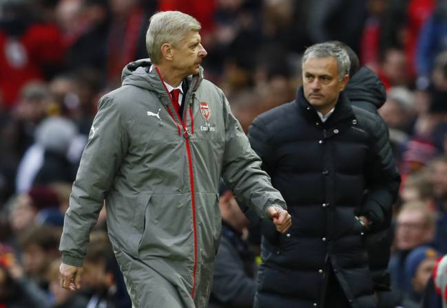 Arsene Wenger and Jose Mourinho head towards the tunnel with mixed thoughts.