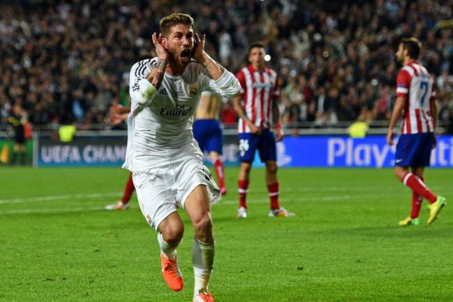 Sergio Ramos celebrates his late goal against Atletico Madrid