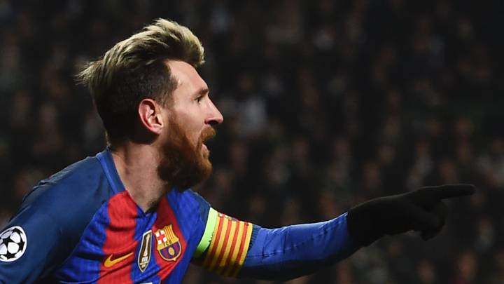Barcelona's Argentinian striker Lionel Messi celebrates scoring the opening goal against Glasgow Celtic