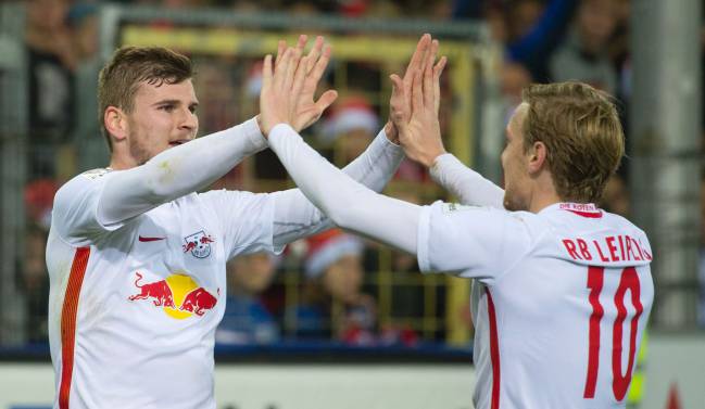 Leipzig's forward Timo Werner (L) celebrates with teammate Swedish forward Emil Forsberg.