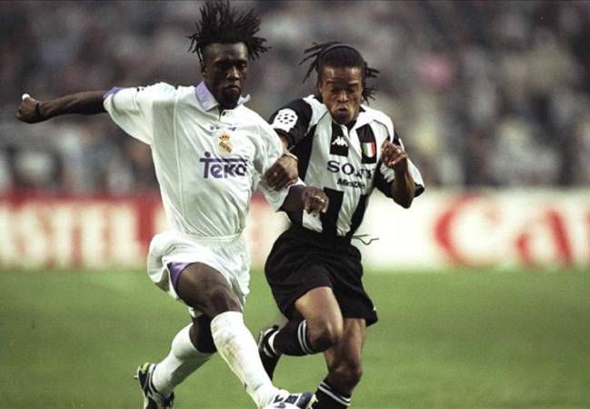 Clarence Seedorf in action for Real Madrid against Edgar Davids of Juventus.