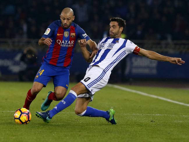Javier Mascherano in action against Real Sociedad.