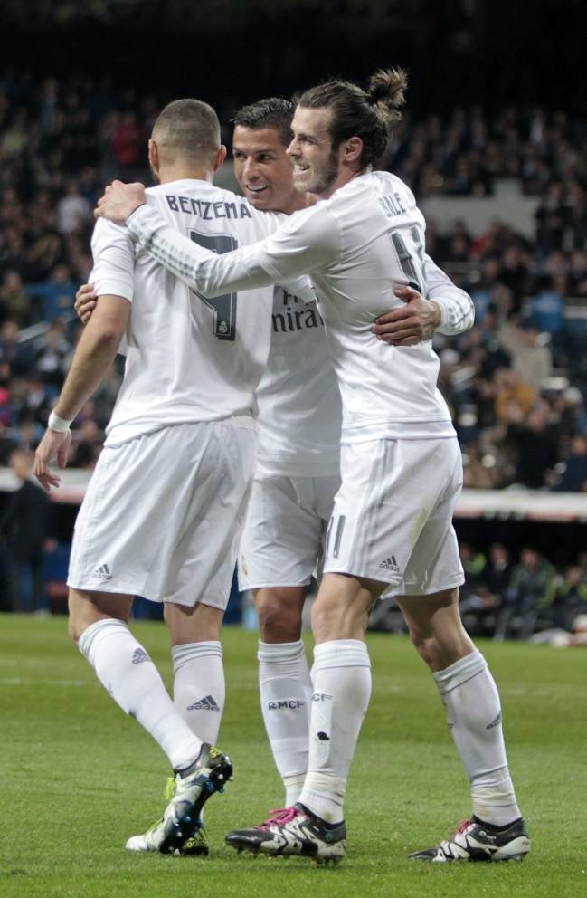 The BBC celebrate scoring again Sevilla last season.