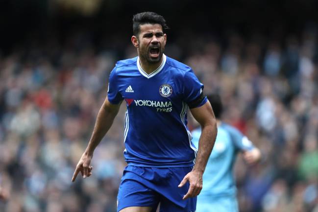 Diego Costa celebrates scoring his team's first goal to make it 1-1.