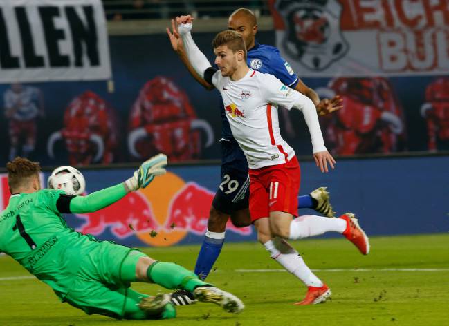 RB Leipzig Timo Werner in action against FC Schalke 04's goalkeeper Ralf Faehrmann before he was fouled for a penalty kick.