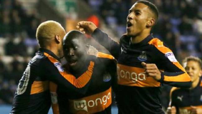 Mo Diame celebrates the opener for Newcastle.
