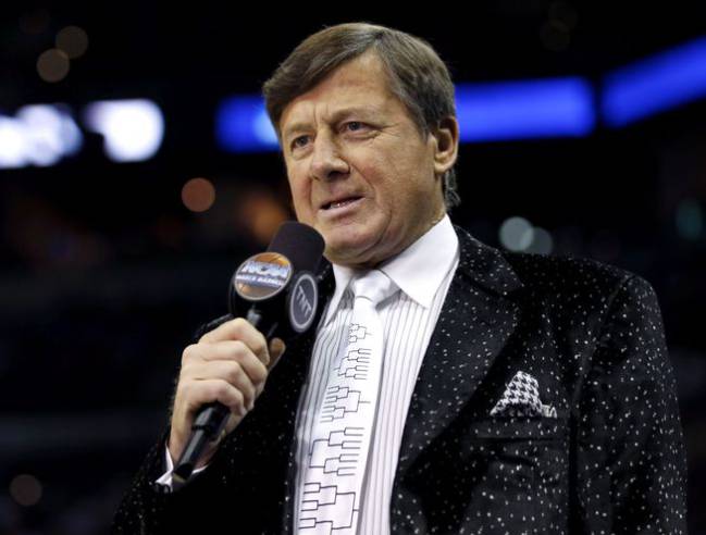 TV announcer Craig Sager talks in the first half of a men's college basketball game between the Iowa State Cyclones and the North Carolina Central Eagles during the second round of the 2014 NCAA Tournament at AT&T Center.