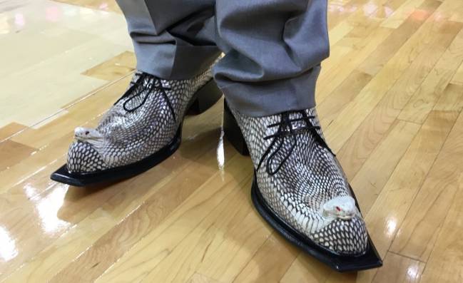 Craig Sager with a pair of snake shoes.