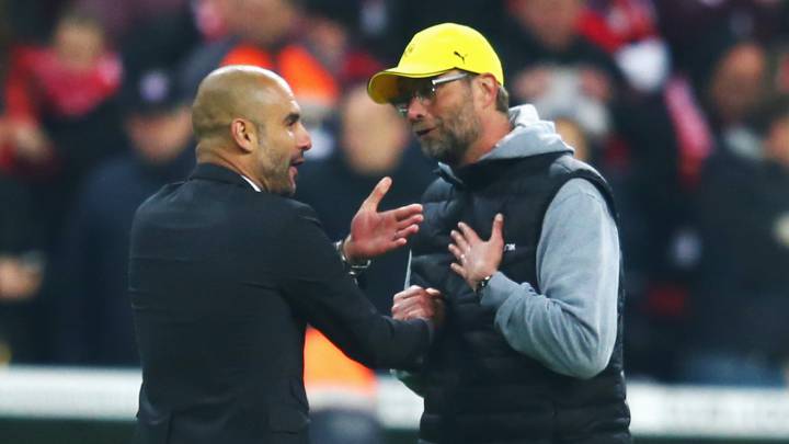 Head coaches Pep Guardiola of Muenchen and Juergen Klopp