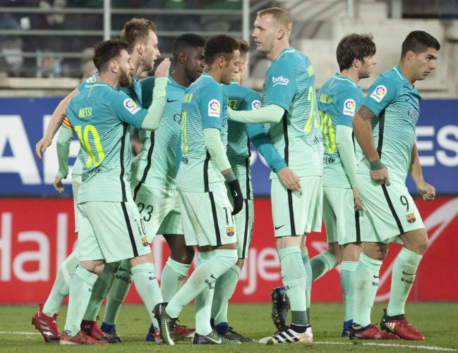 Barcelona celebrate scoring against Eibar.