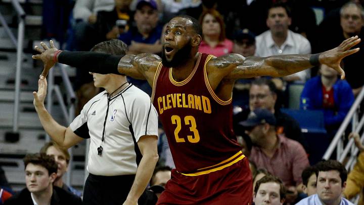 Cleveland Cavaliers forward LeBron James reacts to the call of an official during the second half of a game against the New Orleans Pelicans