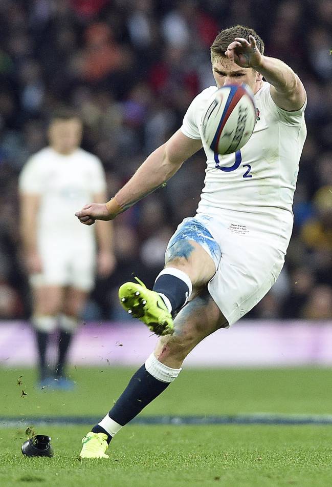 England's Owen Farrell puts his boot through it.