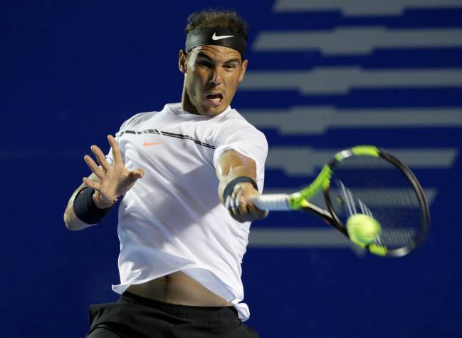 Spain's Rafael Nadal giving his all against USA's Sam Querrey.