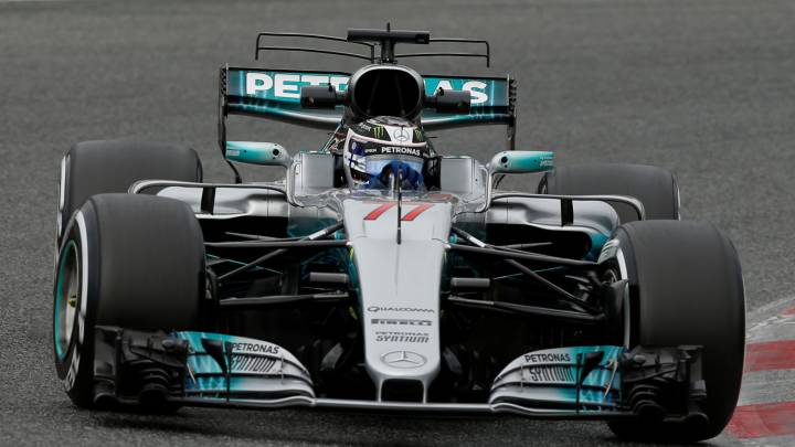 Mercedes driver Valtteri Bottas set the fastest time of testing so far this pre-season while Fernando Alonso's McLaren suffers an engine faliure