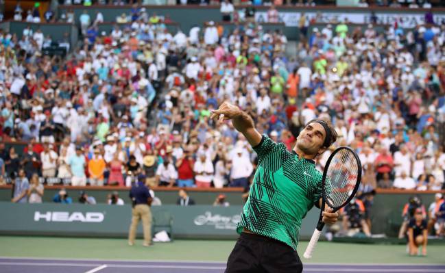 Roger Federer of Switzerland celebrates to the crowd