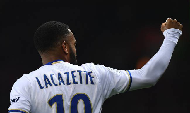 Alexandre Lacazette celebrates opening the scoring during the French L1 football match between Paris Saint-Germain vs Olympique Lyon