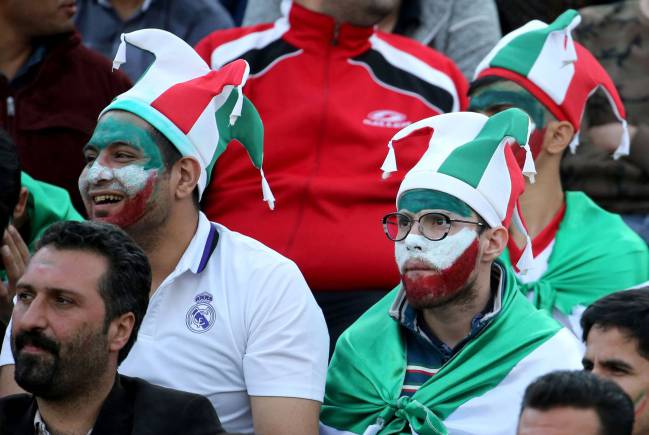 Iran's football fans attend the 2018 World Cup qualifying football match between Iran and China at the Azadi Stadium in Tehran.