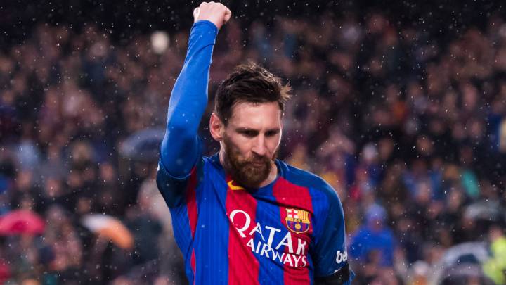 Lionel Messi of FC Barcelona celebrates after scoring his team's third goal during the La Liga match between FC Barcelona and Sevilla FC