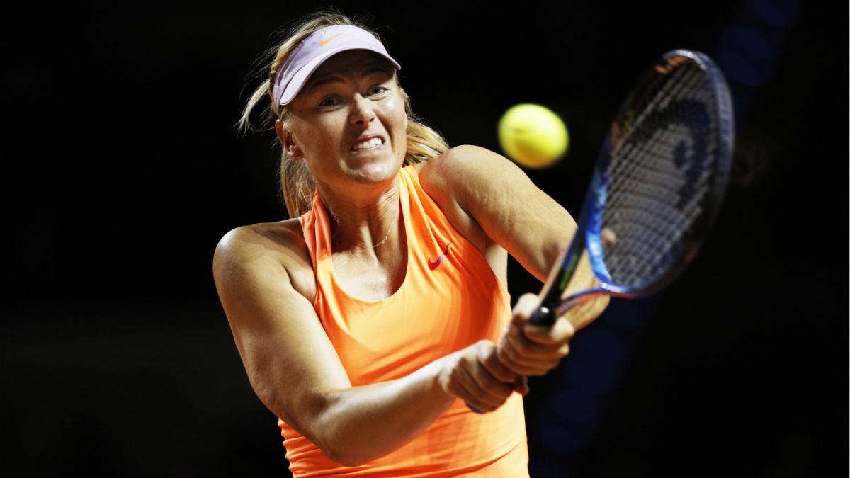 Fired-up Sharapova fights back to reach Madrid second round